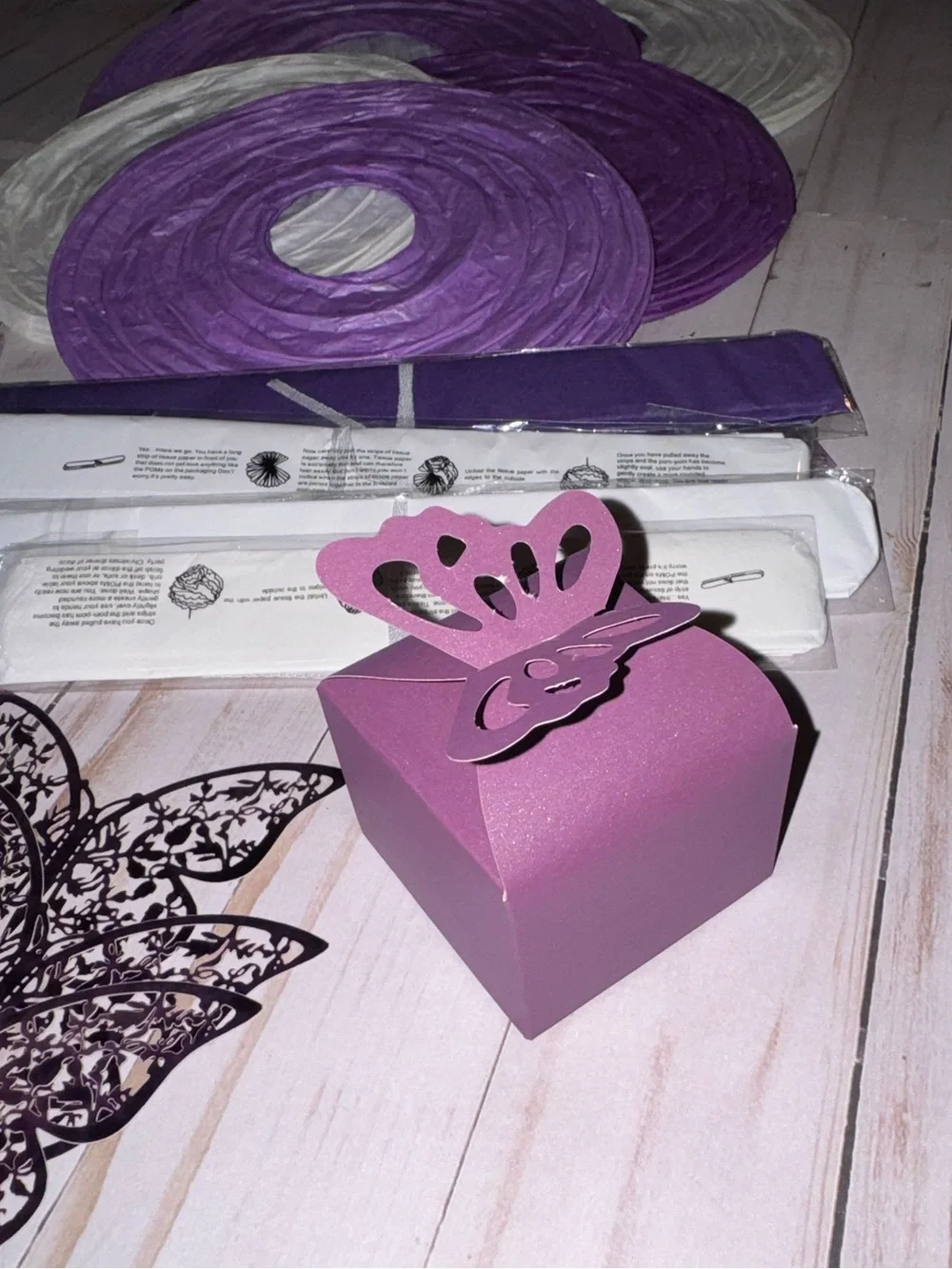 Purple and white party supplies